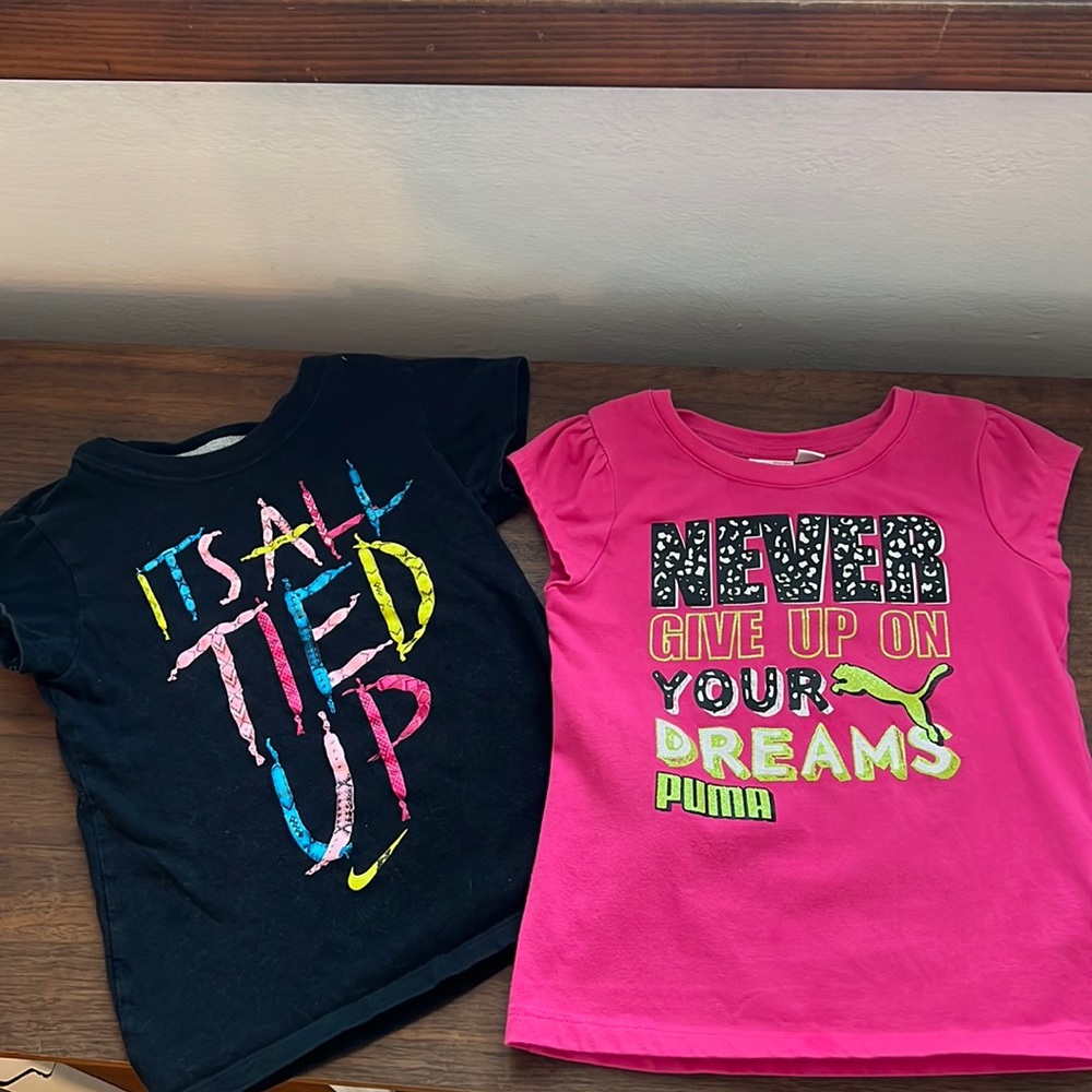 Set of 2 girls sport T-shirt’s in size 6.